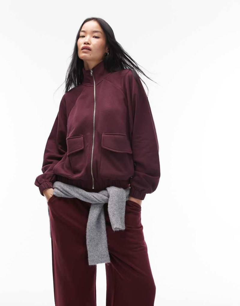 ASOS DESIGN - Sweatshirt in Pflaume mit Stehkragen und durchgehendem Reißverschluss-Lila von ASOS DESIGN