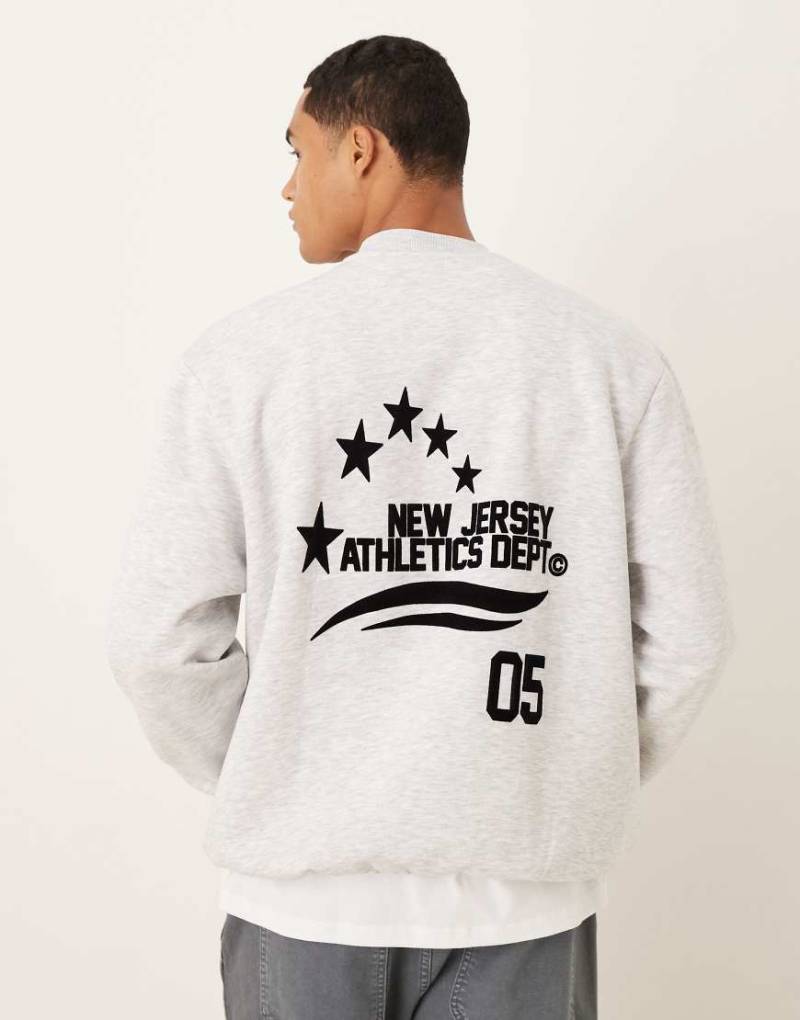 ASOS DESIGN - Sweatshirt in meliertem Grau mit „Sporty Star"-Print von ASOS DESIGN