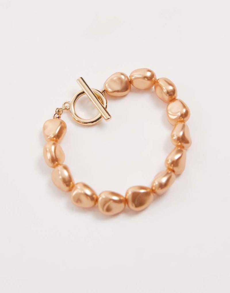 ASOS DESIGN - T-Steg-Armband in Goldoptik mit Kunstperlen-Detail-Goldfarben von ASOS DESIGN