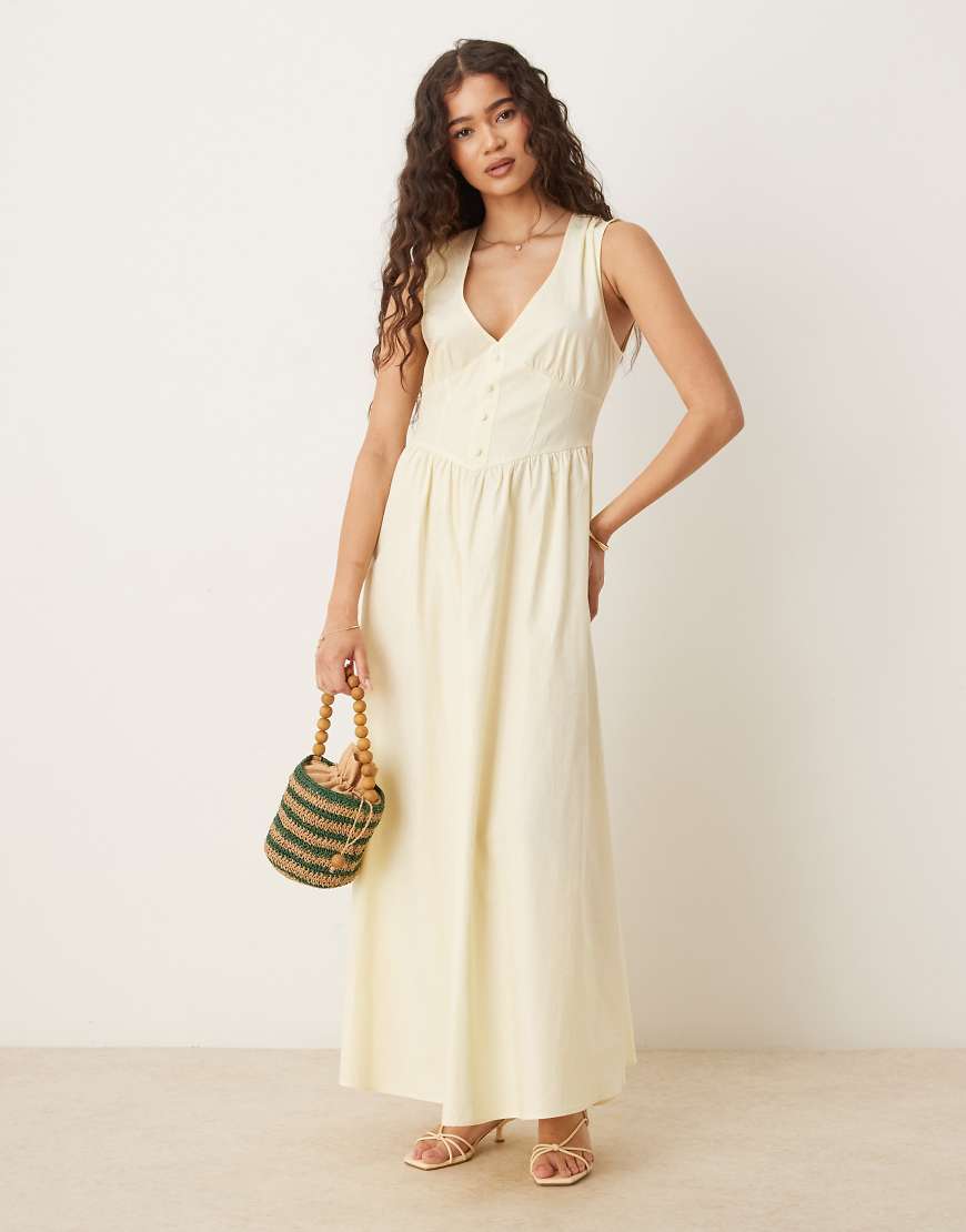 ASOS DESIGN - Tailliertes Midikleid in Buttermilchgelb mit V-Ausschnitt und Knopfleiste von ASOS DESIGN