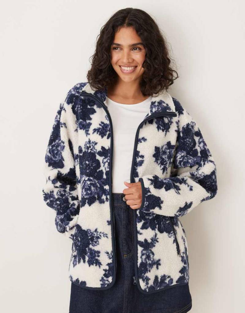 ASOS DESIGN - Teddyfleece-Jacke in Cremeweiß mit marineblauem Blumenmotiv und Reißverschluss von ASOS DESIGN