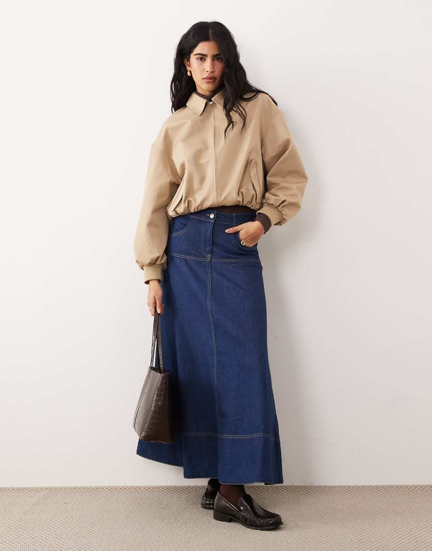ASOS DESIGN - Tellerrock aus Denim in Mittelblau mit abfallender Taille von ASOS DESIGN
