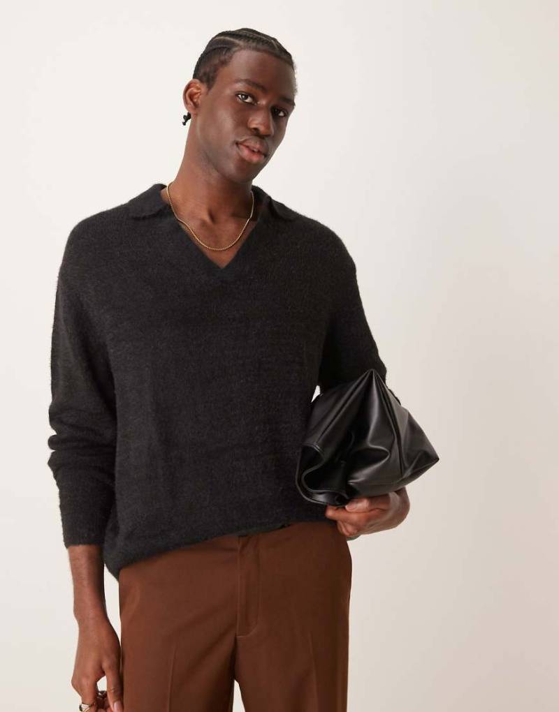 ASOS DESIGN - Texturierter Pullover in Schwarz mit eingekerbtem Ausschnitt von ASOS DESIGN