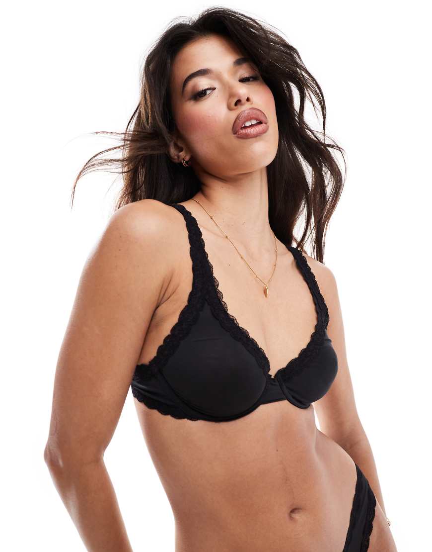 ASOS DESIGN - Tia - Superweicher Bügel-BH in Schwarz aus Mikrofaser mit Spitzenbesatz ASOS DESIGN - Tia - Superweicher Bügel-BH in Schwarz aus Mikrofaser mit Spitzenbesatz von ASOS DESIGN