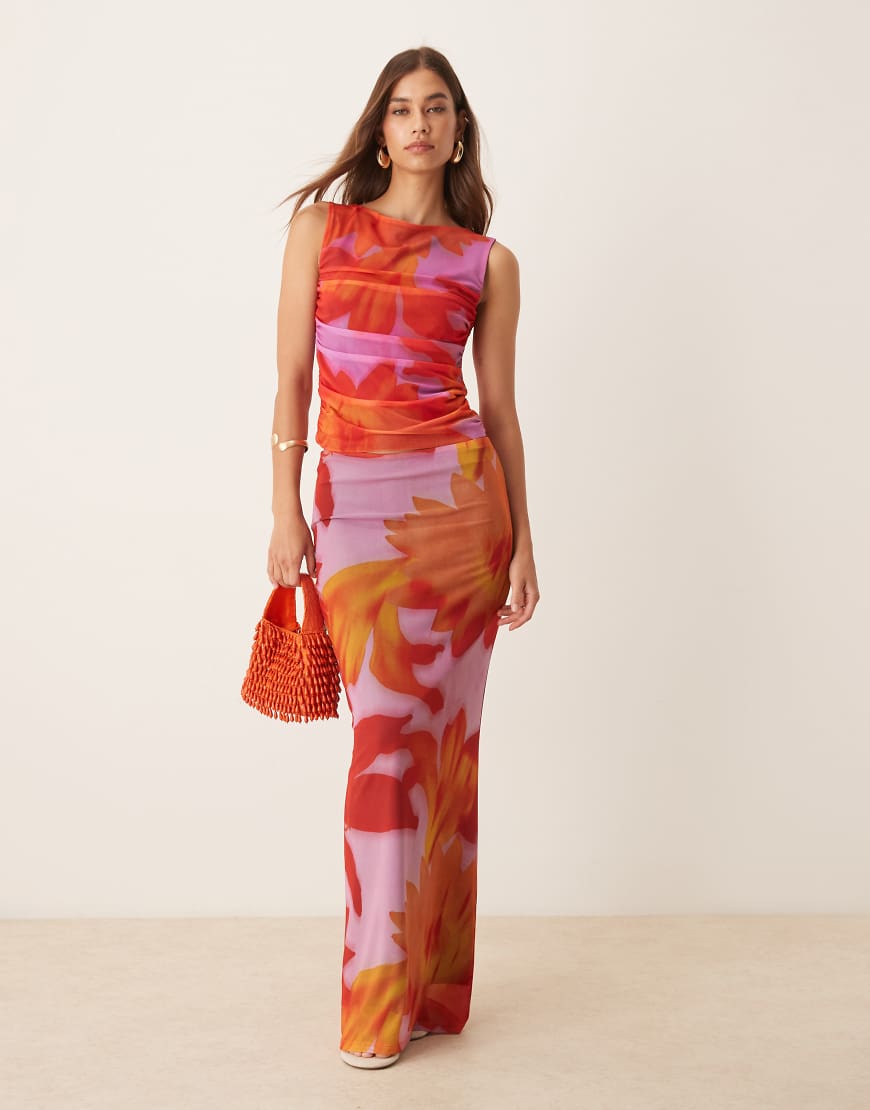 ASOS DESIGN - Tief sitzender Rock aus Netzstoff in Orange mit großflächigem tropischem Blumenmuster, Kombiteil ASOS DESIGN - Tief sitzender Rock aus Netzstoff in Orange mit großflächigem tropischem Blumenmuster, Kombiteil von ASOS DESIGN