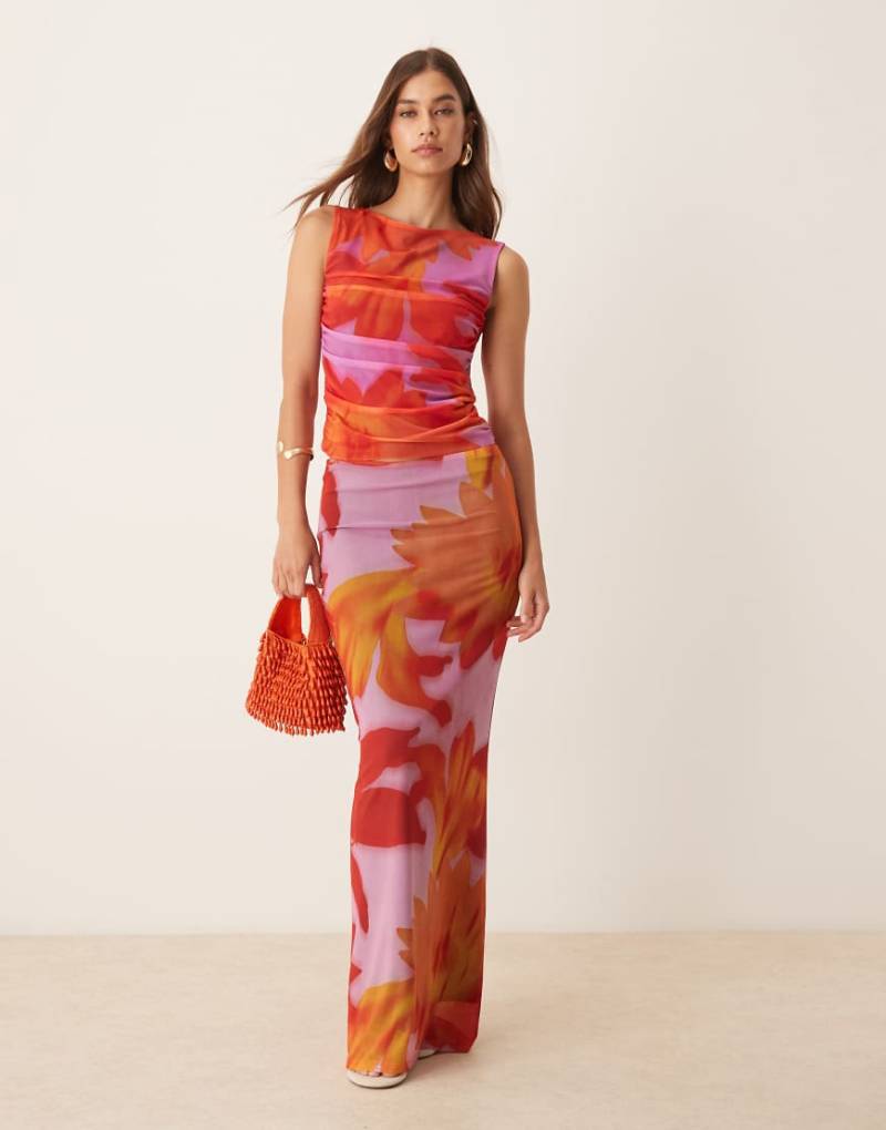 ASOS DESIGN - Tief sitzender Rock aus Netzstoff in Orange mit großflächigem tropischem Blumenmuster, Kombiteil von ASOS DESIGN