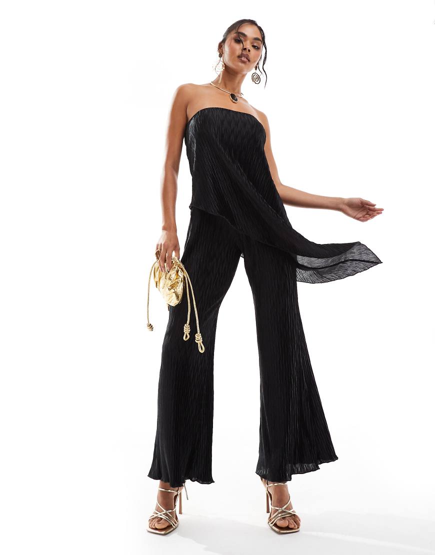 ASOS DESIGN - Trägerloser plissierter Jumpsuit in Schwarz mit weitem Bein ASOS DESIGN - Trägerloser plissierter Jumpsuit in Schwarz mit weitem Bein von ASOS DESIGN