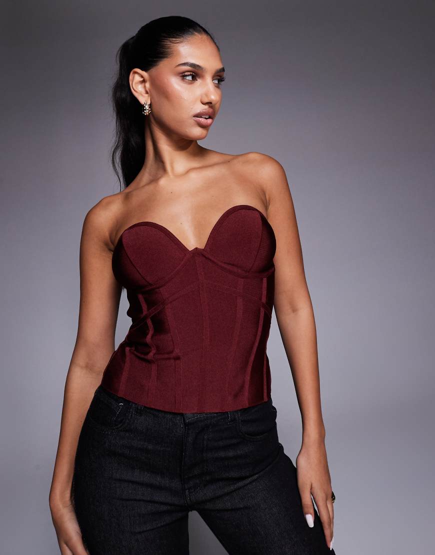 ASOS DESIGN - Trägerloses Korsett-Oberteil im Bandagen-Stil in Burgunderrot mit Körbchen von ASOS DESIGN