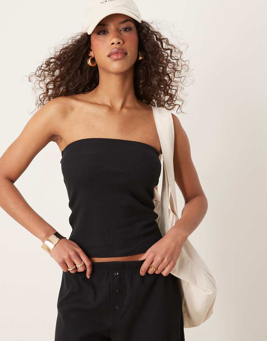 ASOS DESIGN - Trägerloses Longline-Oberteil in Schwarz mit Waffeltextur ASOS DESIGN - Trägerloses Longline-Oberteil in Schwarz mit Waffeltextur von ASOS DESIGN