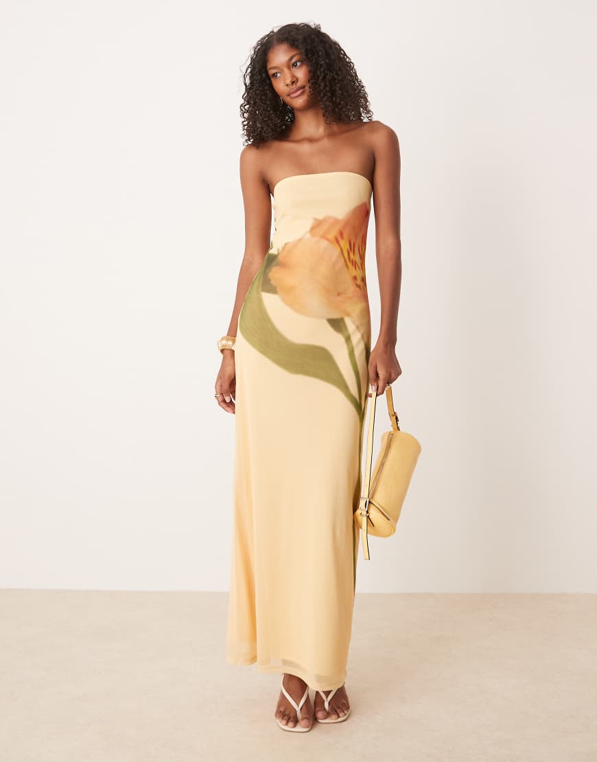 ASOS DESIGN - Trägerloses Netzstoff-Maxikleid in Buttermilchgelb mit platziertem Blumenprint ASOS DESIGN - Trägerloses Netzstoff-Maxikleid in Buttermilchgelb mit platziertem Blumenprint von ASOS DESIGN