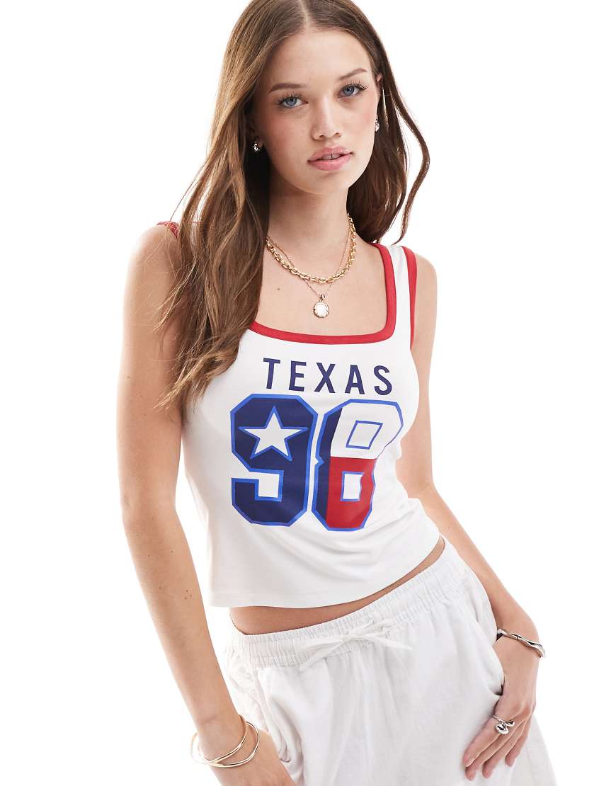 ASOS DESIGN - Trägertop in Weiß mit Texas-Grafikprint und Kontrastbesatz ASOS DESIGN - Trägertop in Weiß mit Texas-Grafikprint und Kontrastbesatz von ASOS DESIGN
