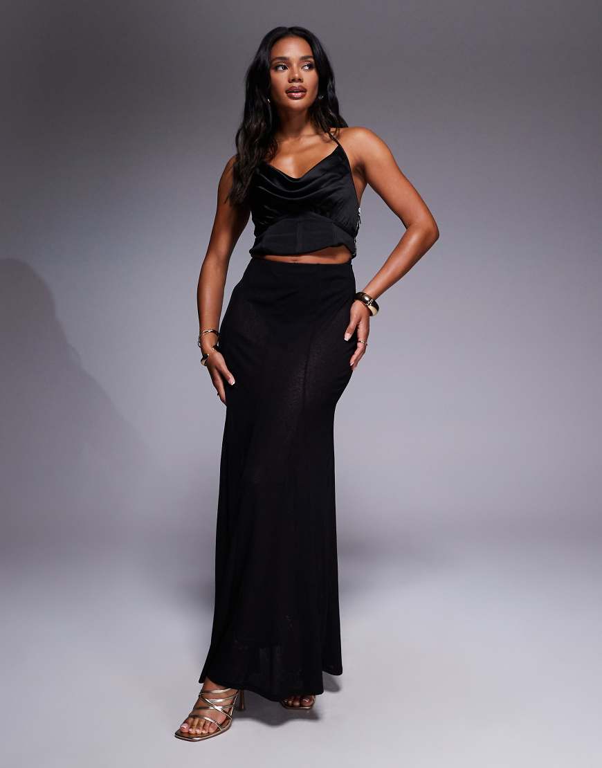 ASOS DESIGN - Transparenter Godet-Maxirock in Schwarz aus Netzstoff ASOS DESIGN - Transparenter Godet-Maxirock in Schwarz aus Netzstoff von ASOS DESIGN