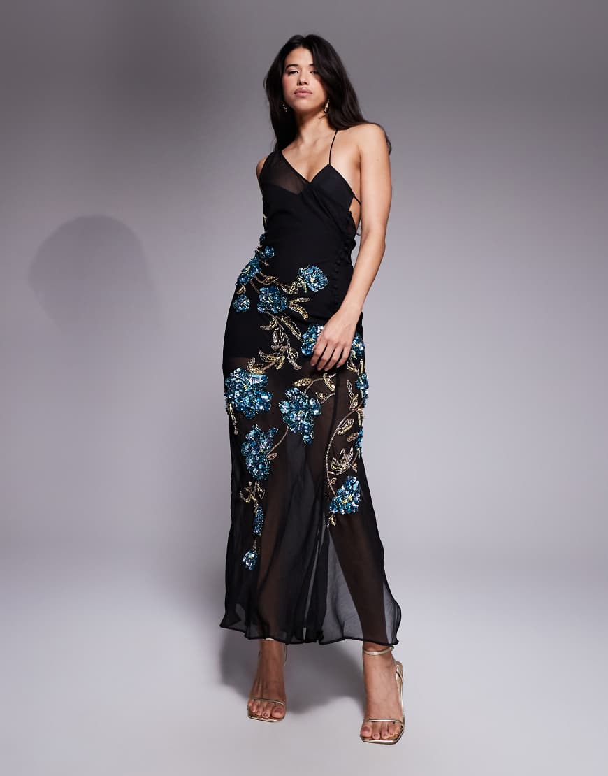 ASOS DESIGN - Transparentes, verziertes Maxikleid in Schwarz mit herabfließendem Blumenmotiv ASOS DESIGN - Transparentes, verziertes Maxikleid in Schwarz mit herabfließendem Blumenmotiv von ASOS DESIGN