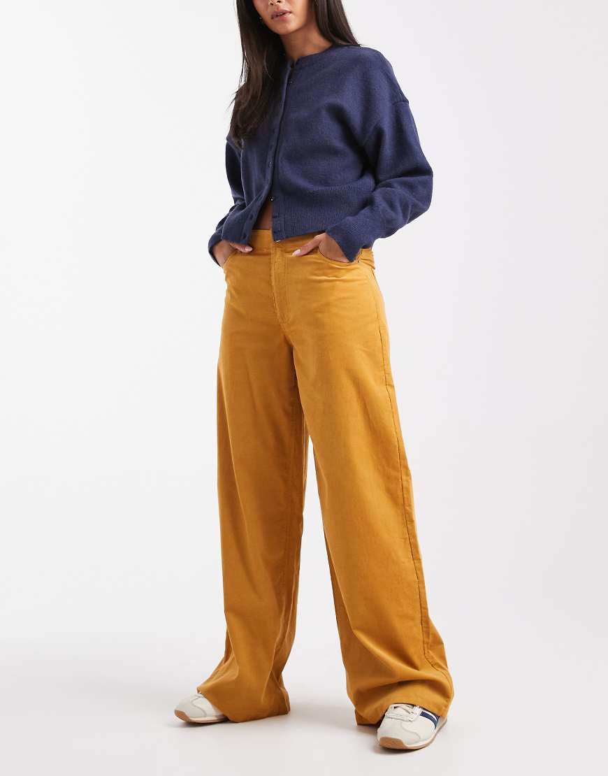 ASOS DESIGN - Trucker-Hose aus Cord in Senfgelb mit weitem Bein von ASOS DESIGN