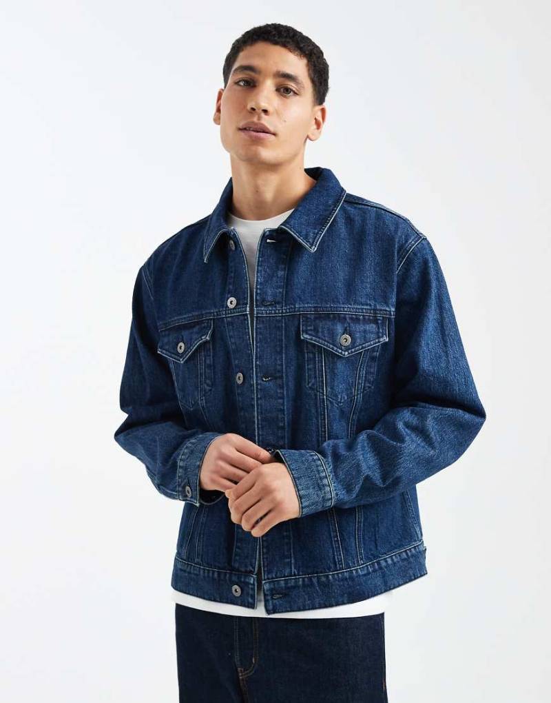 ASOS DESIGN - Trucker-Jacke aus Denim in dunkelblauer Waschung von ASOS DESIGN
