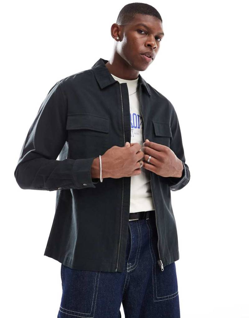 ASOS DESIGN - Twill-Hemdjacke in verwaschenem Schwarz mit Reißverschluss von ASOS DESIGN