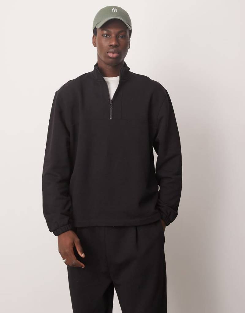 ASOS DESIGN - Oversize-Sweatshirt in Schwarz mit kurzem Reißverschluss, Kombiteil von ASOS DESIGN