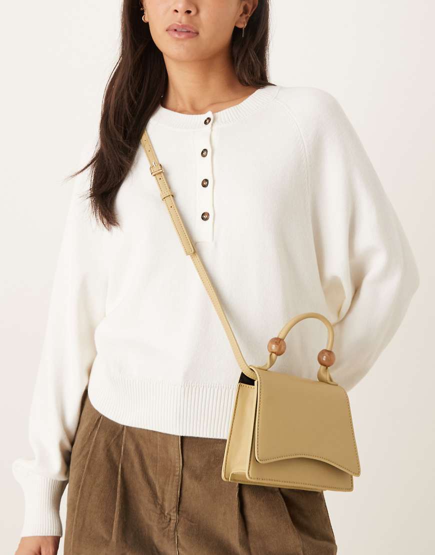 ASOS DESIGN - Umhängetasche in Pistaziengrün mit abnehmbarem Riemen und Kunstharz-Kugeln am Henkel von ASOS DESIGN