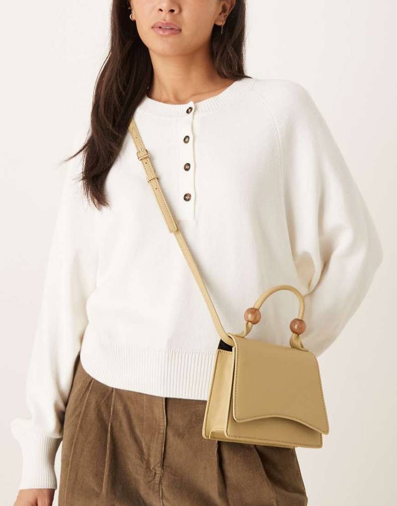 ASOS DESIGN - Umhängetasche in Pistaziengrün mit abnehmbarem Riemen und Kunstharz-Kugeln am Henkel von ASOS DESIGN