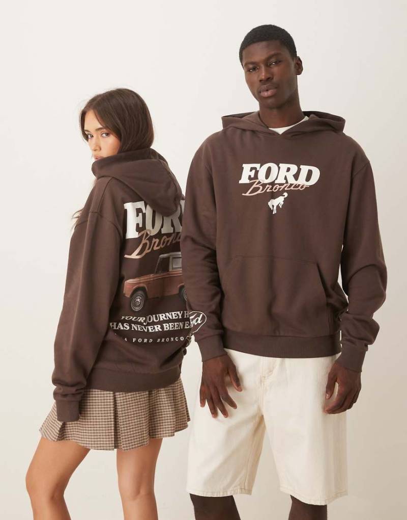 ASOS DESIGN - Unisex - Oversize-Kapuzenpullover in Braun mit „Ford"-Prints-Brown von ASOS DESIGN