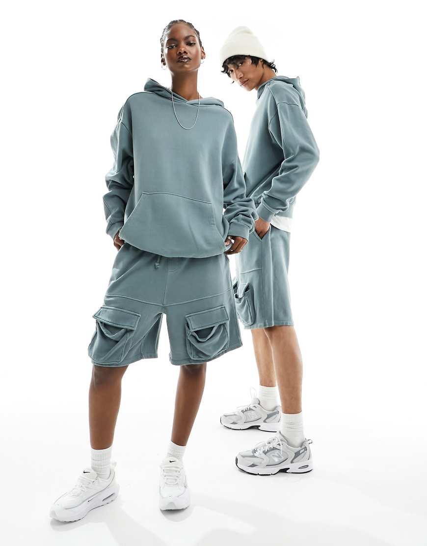 ASOS DESIGN - Unisex - Oversize-Kapuzenpullover in verwaschenem Blaugrün mit Ziernähten, Kombiteil ASOS DESIGN - Unisex - Oversize-Kapuzenpullover in verwaschenem Blaugrün mit Ziernähten, Kombiteil von ASOS DESIGN