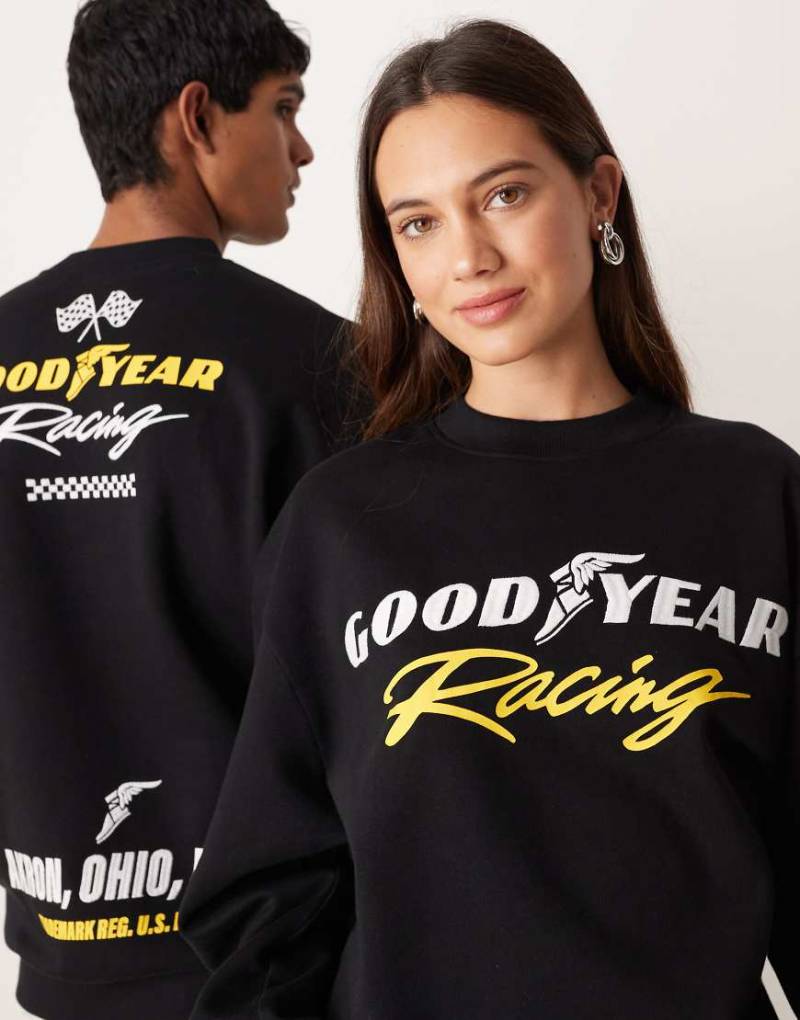 ASOS DESIGN - Unisex - Relaxed Fit Sweatshirt in Dunkelgrau mit Good Year Racing-Stickerei-Schwarz von ASOS DESIGN