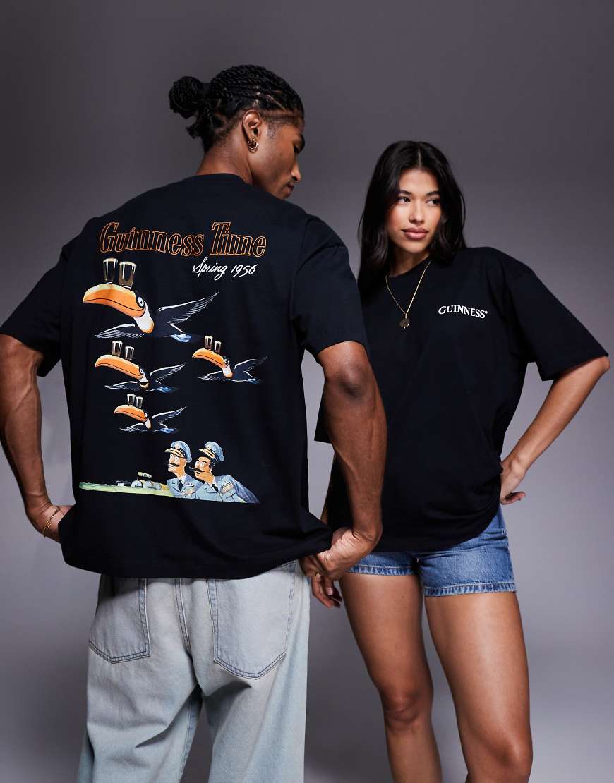ASOS DESIGN - Unisex-T-Shirt in Schwarz mit „Guinness"-Prints in Oversize-Passform von ASOS DESIGN