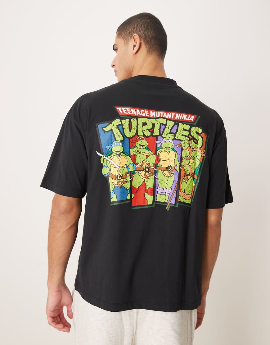 ASOS DESIGN - Unisex-T-Shirt in Schwarz mit „Ninja Turtles"-Vintage-Print und Oversize-Schnitt von ASOS DESIGN