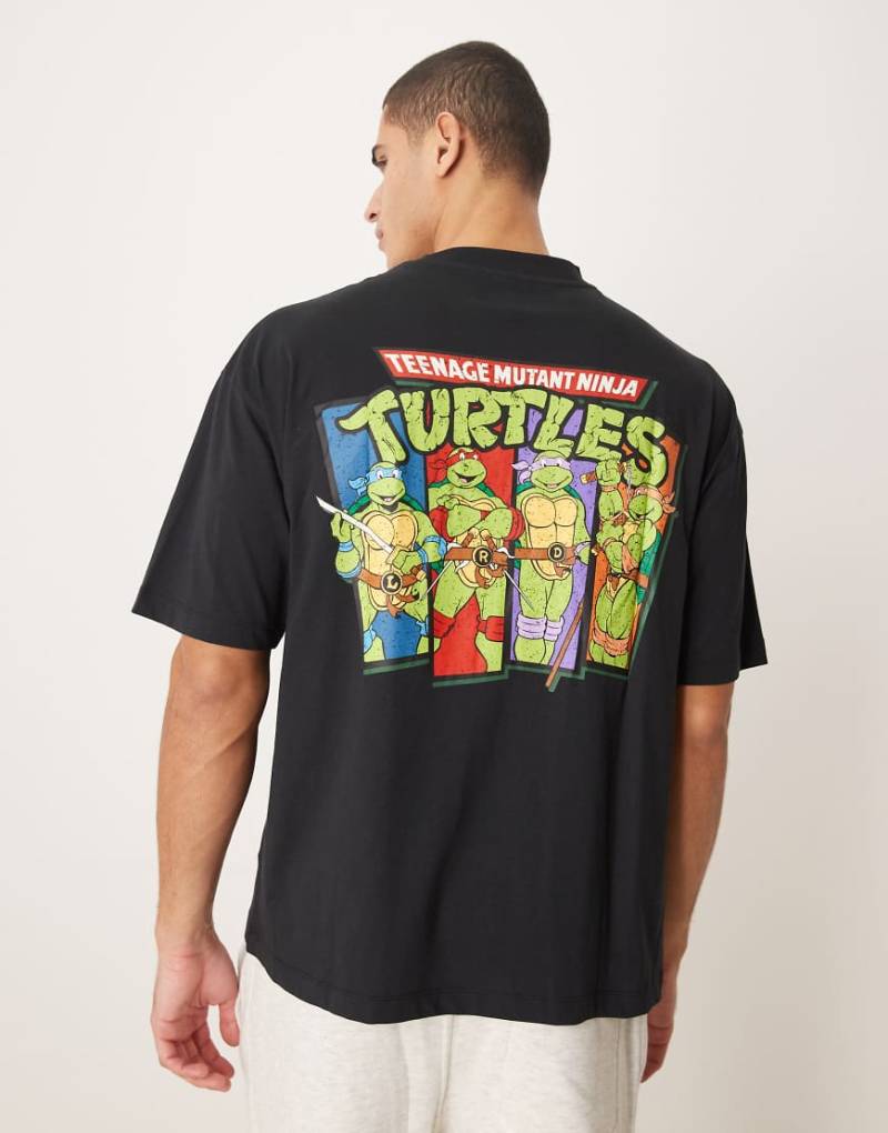 ASOS DESIGN - Unisex-T-Shirt in Schwarz mit „Ninja Turtles"-Vintage-Print und Oversize-Schnitt von ASOS DESIGN