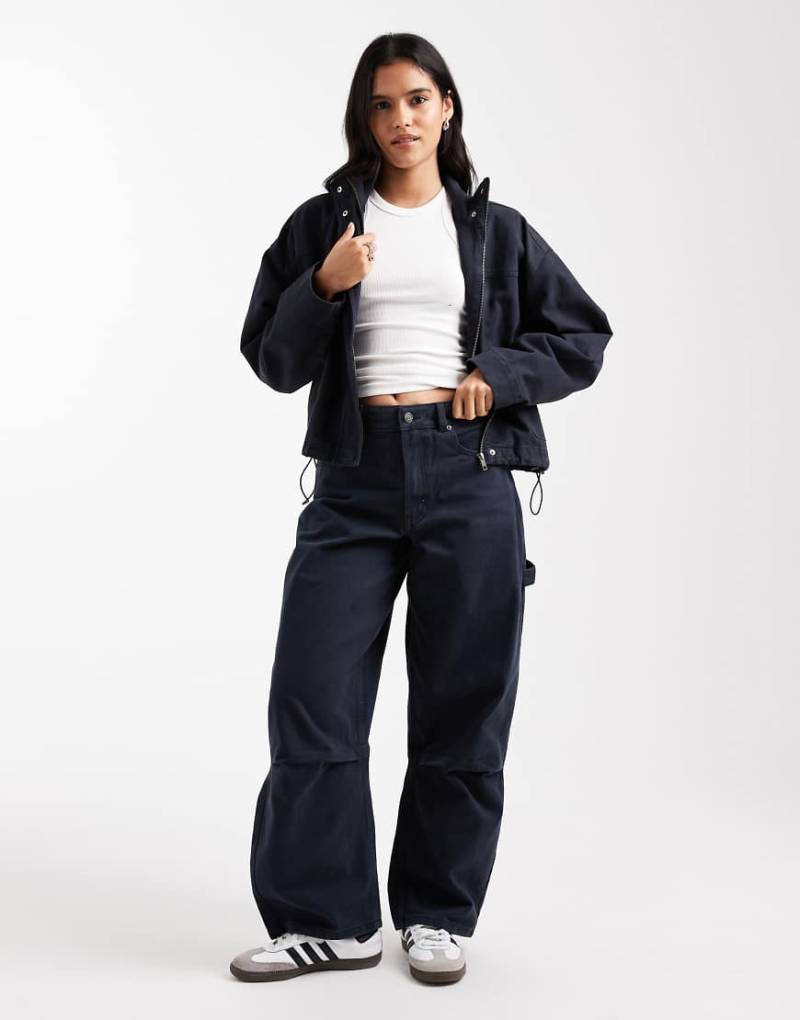 ASOS DESIGN - Utility-Jeans mit abgerundetem Beinschnitt in Marineblau, Kombiteil von ASOS DESIGN