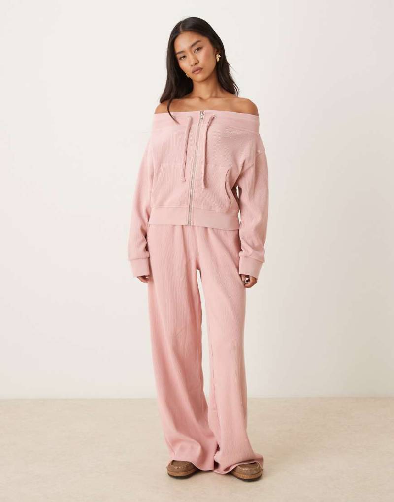 ASOS DESIGN - Waffelstrick-Jogginghose in Rosa mit Paperbag-Bund von ASOS DESIGN
