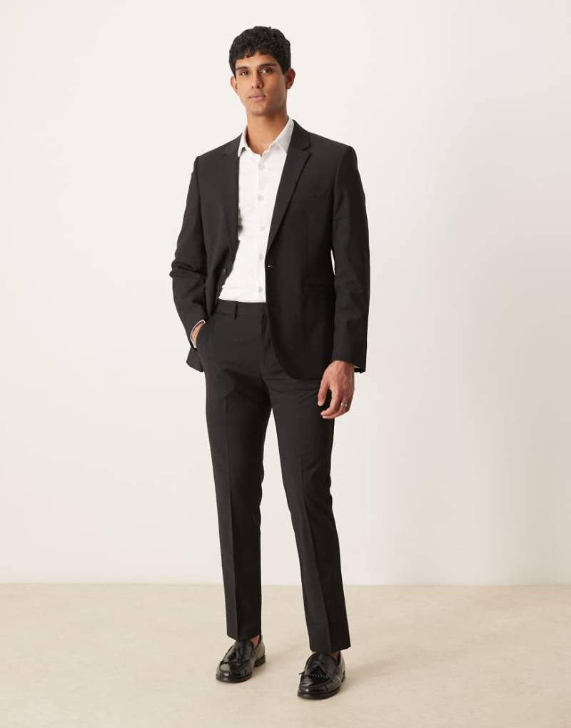 ASOS DESIGN - Waschbare Slim Fit Anzughose in Schwarz mit leichter Kammwolle von ASOS DESIGN