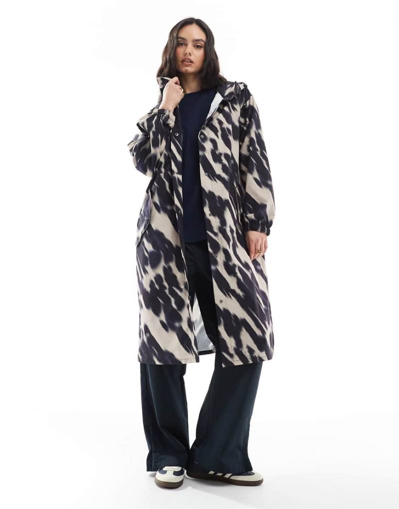 ASOS DESIGN - Wasserabweisende Regenjacke mit abstraktem Muster in Schwarz-Weiß-Bunt von ASOS DESIGN