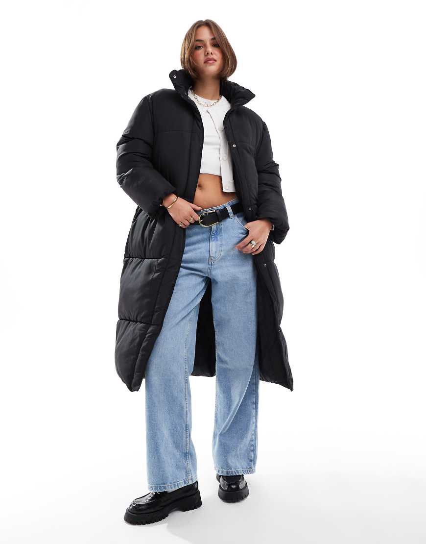 ASOS DESIGN - Wattierte Longline-Jacke in Schwarz ASOS DESIGN - Wattierte Longline-Jacke in Schwarz von ASOS DESIGN