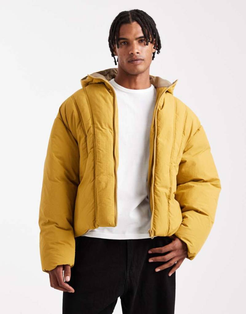 ASOS DESIGN - Wattierte Oversize-Jacke in dunklem Senfgelb von ASOS DESIGN