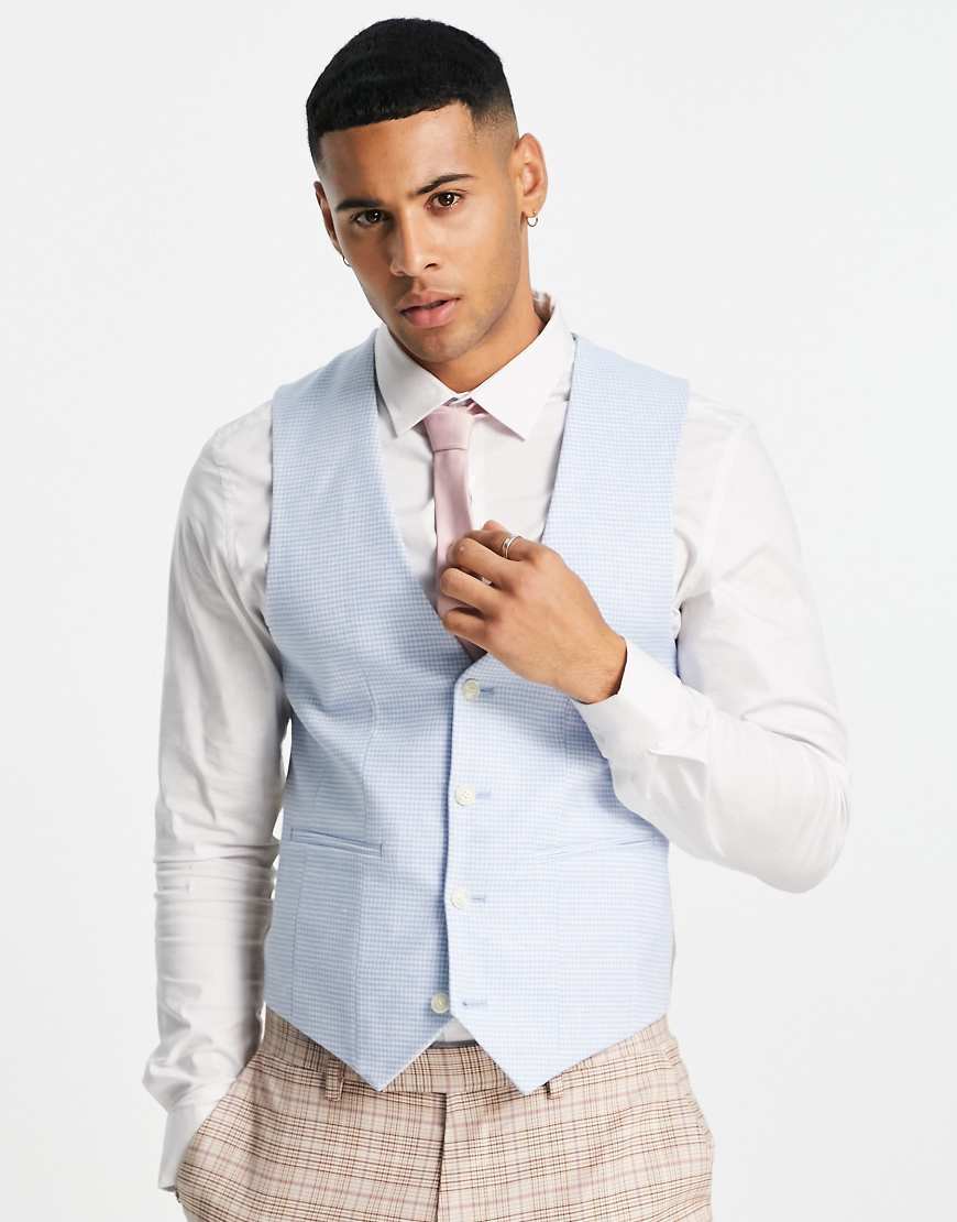ASOS DESIGN Wedding - Super eng geschnittene Weste aus Leinenmischung in Blau mit kleinem Hahnentrittmuster ASOS DESIGN Wedding - Super eng geschnittene Weste aus Leinenmischung in Blau mit kleinem Hahnentrittmuster von ASOS DESIGN