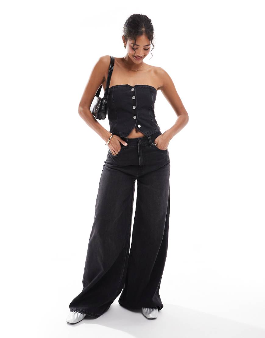 ASOS DESIGN - Jeans in Schwarz mit weitem Bein ASOS DESIGN - Jeans in Schwarz mit weitem Bein von ASOS DESIGN
