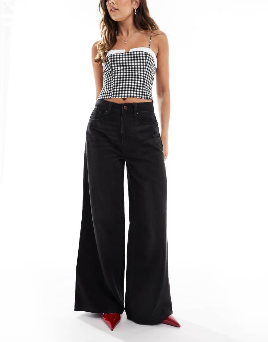 ASOS DESIGN - Jeans in verwaschenem Schwarz mit weitem Bein ASOS DESIGN - Jeans in verwaschenem Schwarz mit weitem Bein von ASOS DESIGN
