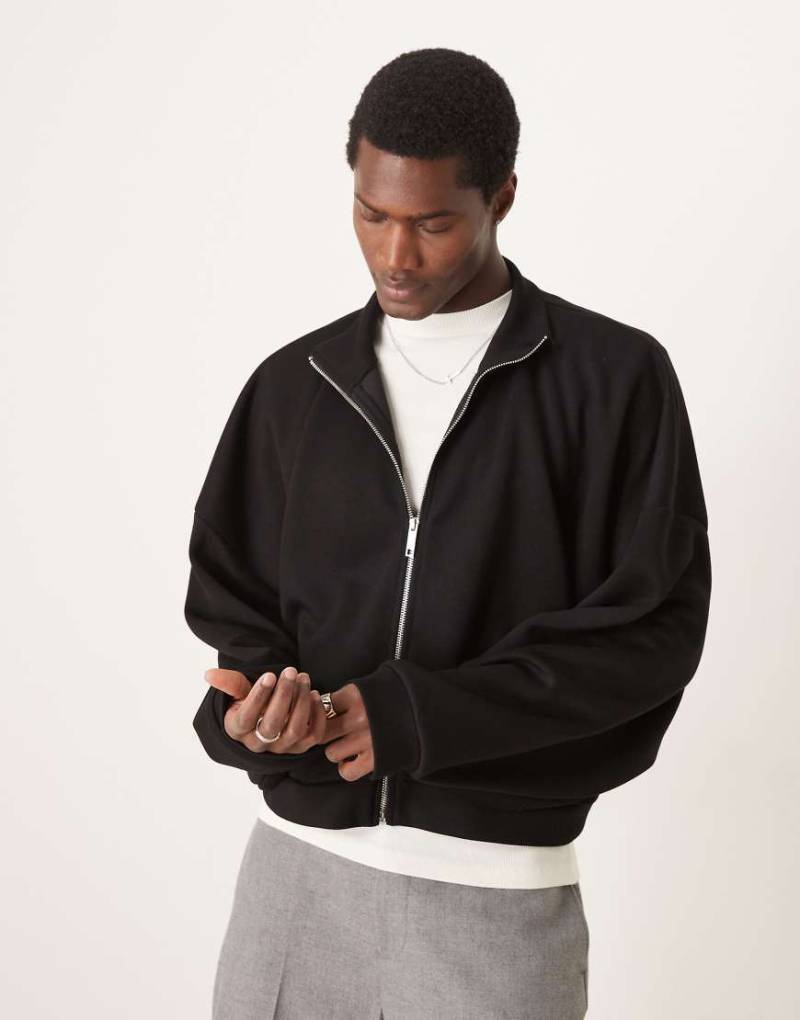 ASOS DESIGN - Weiche, kurze Trainingsjacke aus neoprenartigem Stoff in Schwarz mit extremem Oversize-Schnitt von ASOS DESIGN