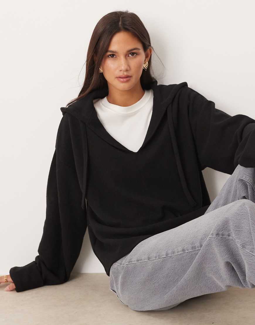 ASOS DESIGN - Weicher Kapuzenpullover in Schwarz mit umgeschlagenen Ärmelbündchen von ASOS DESIGN
