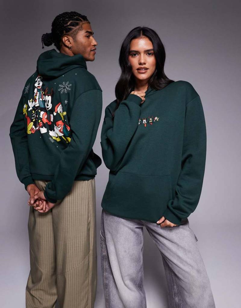 ASOS DESIGN - Disney - Weihnachten - Relaxed-Fit-Kapuzenpullover in Dunkelgrün mit „Mickey & Friends"-Prints von ASOS DESIGN