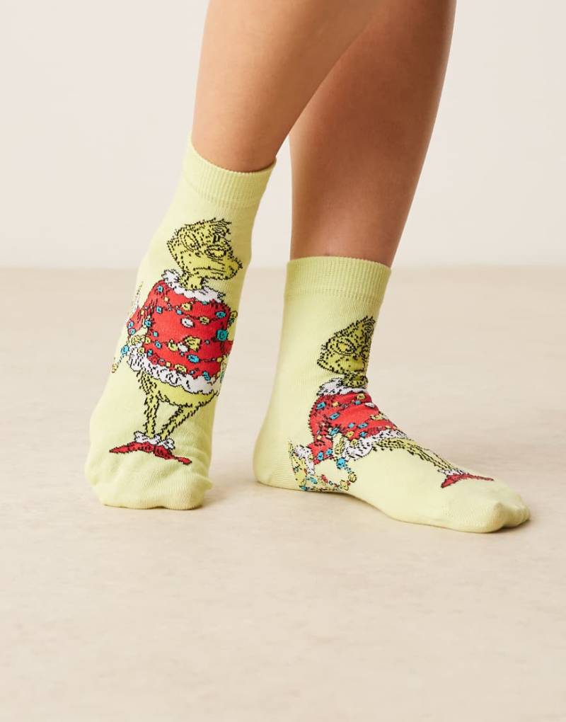 ASOS DESIGN - Weihnachtliche Socken in Grün mit Grinch-Motiv-Rot ASOS DESIGN - Weihnachtliche Socken in Grün mit Grinch-Motiv-Rot von ASOS DESIGN
