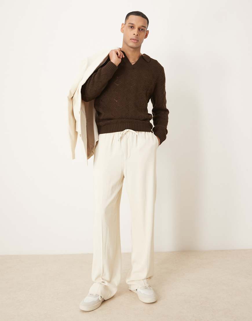 ASOS DESIGN - Weit geschnittene Anzughose in hellem Ecru-Rosa ASOS DESIGN - Weit geschnittene Anzughose in hellem Ecru-Rosa von ASOS DESIGN