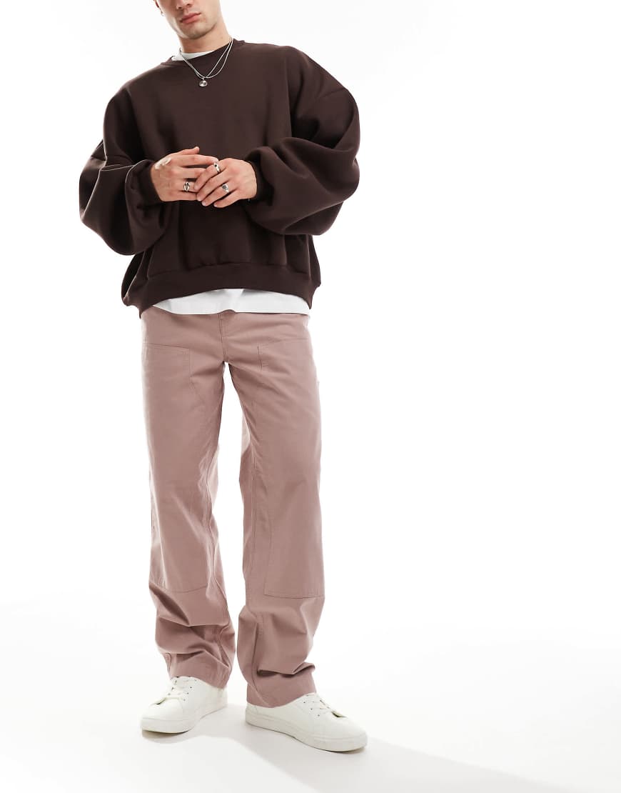 ASOS DESIGN - Weit geschnittene Chinohose in Braun mit Schlaufendetail ASOS DESIGN - Weit geschnittene Chinohose in Braun mit Schlaufendetail von ASOS DESIGN
