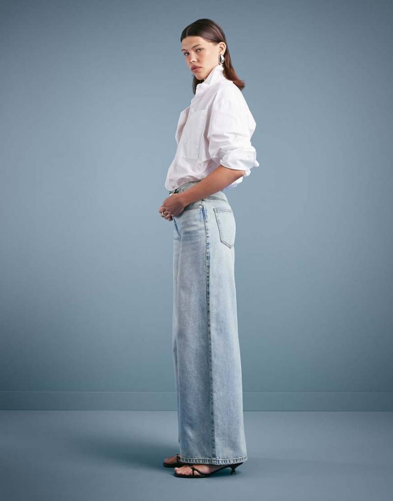 ASOS DESIGN - Weit geschnittene Jeans in Vintage-Waschung mit hohem Bund-Blau von ASOS DESIGN