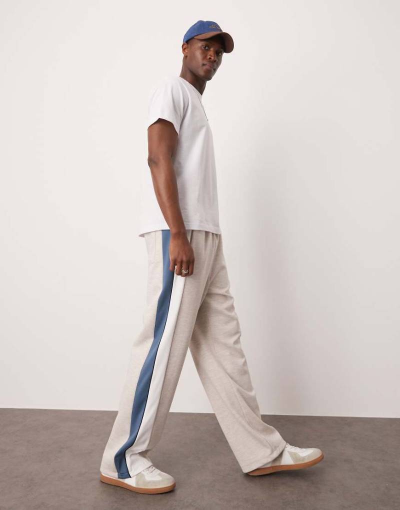 ASOS DESIGN - Weit geschnittene Jogginghose in Grau mit seitlichem Einsätzen von ASOS DESIGN