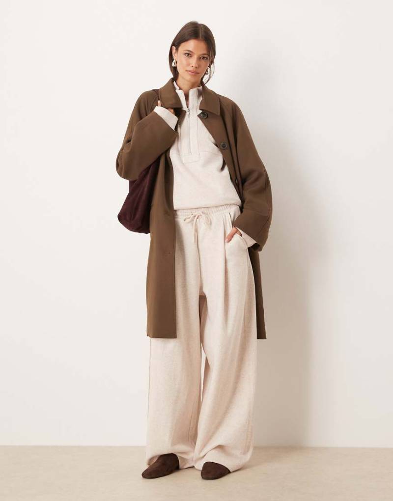 ASOS DESIGN - Weit geschnittene Jogginghose in Haferbeige mit Waffelstruktur-Einsatz, Kombiteil-Neutral ASOS DESIGN - Weit geschnittene Jogginghose in Haferbeige mit Waffelstruktur-Einsatz, Kombiteil-Neutral von ASOS DESIGN