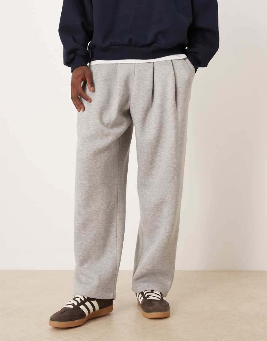 ASOS DESIGN - Weit geschnittene Jogginghose in meliertem Grau mit Bundfalten von ASOS DESIGN