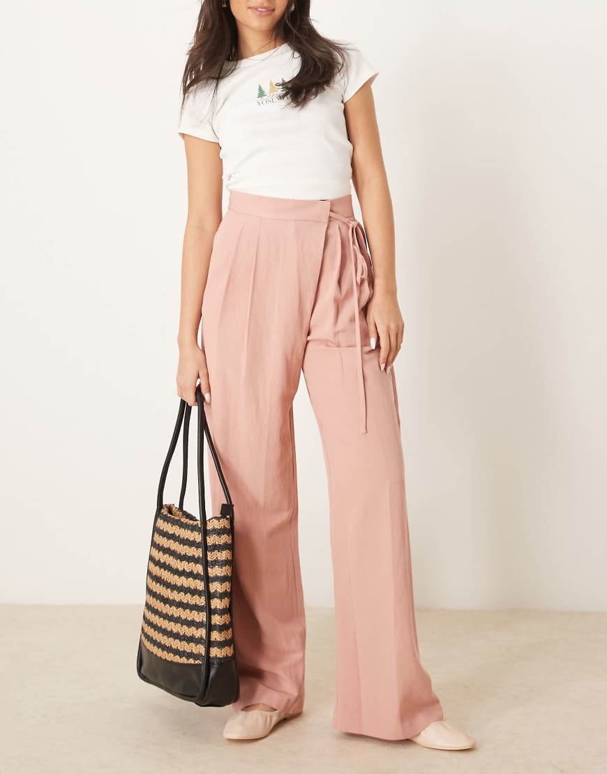ASOS DESIGN - Weit geschnittene Leinenhose in Apricot mit Bindedetail vorne-Rosa von ASOS DESIGN