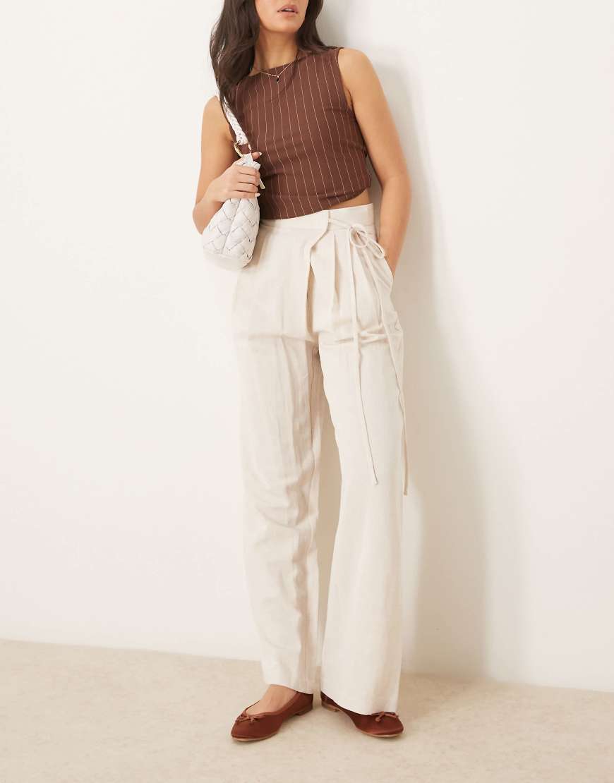 ASOS DESIGN - Weit geschnittene Leinenhose in Stein mit Bindedetail vorne-Neutral von ASOS DESIGN